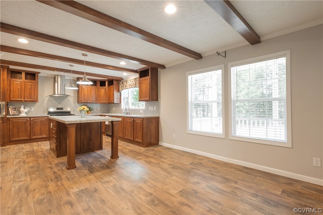 20602 Reese Road Dinwiddie, VA 23841 - Photo 9 of 50 a large kitchen with kitchen island granite countertop wooden cabinets a granite counter tops and a window
