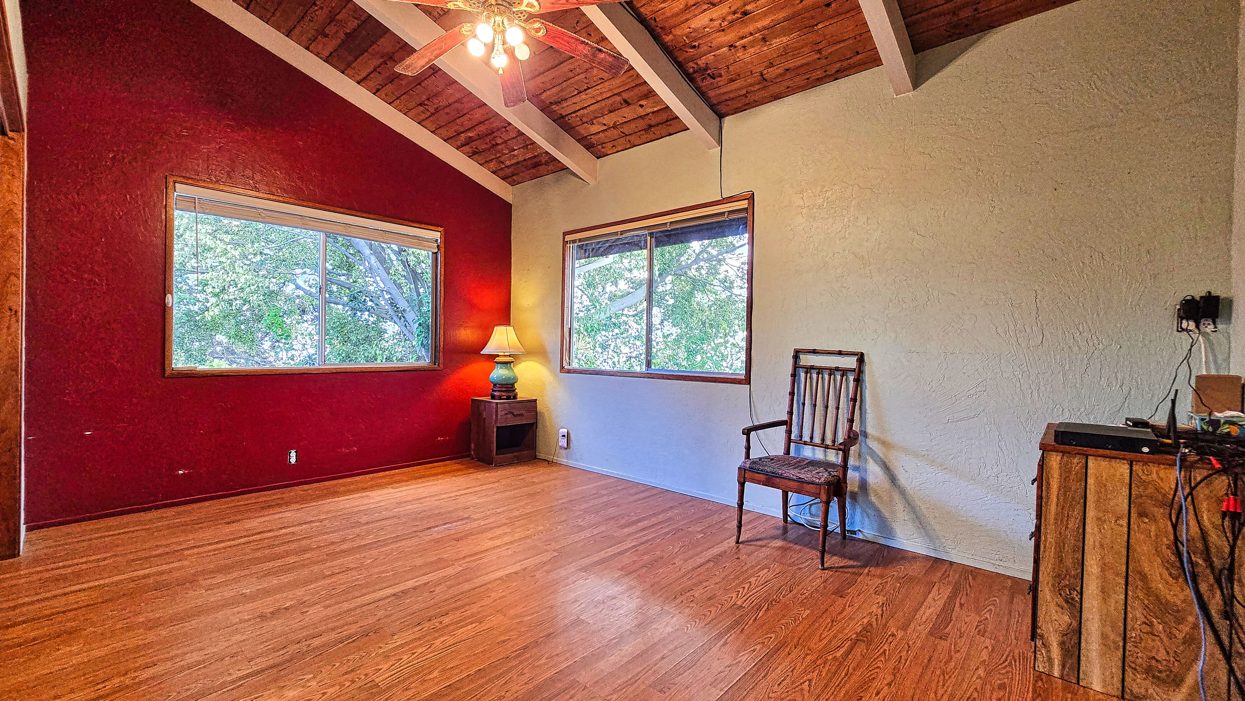 92-8233 Reef Parkway Ocean View, HI 96704 - Photo 12 of 30 a view of a livingroom with furniture and a window