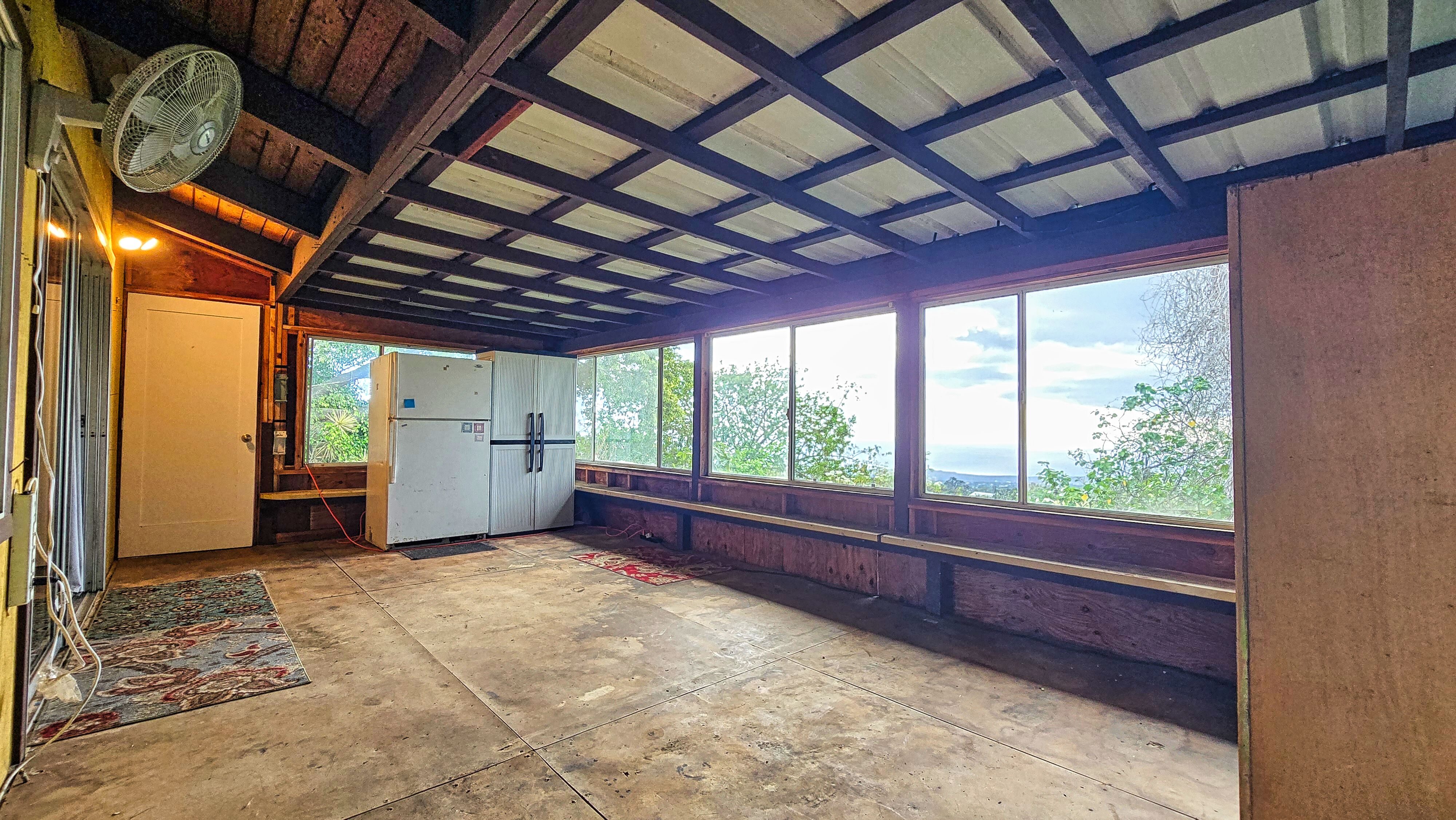 92-8233 Reef Parkway Ocean View, HI 96704 - Photo 18 of 30 a view of an empty room with a window