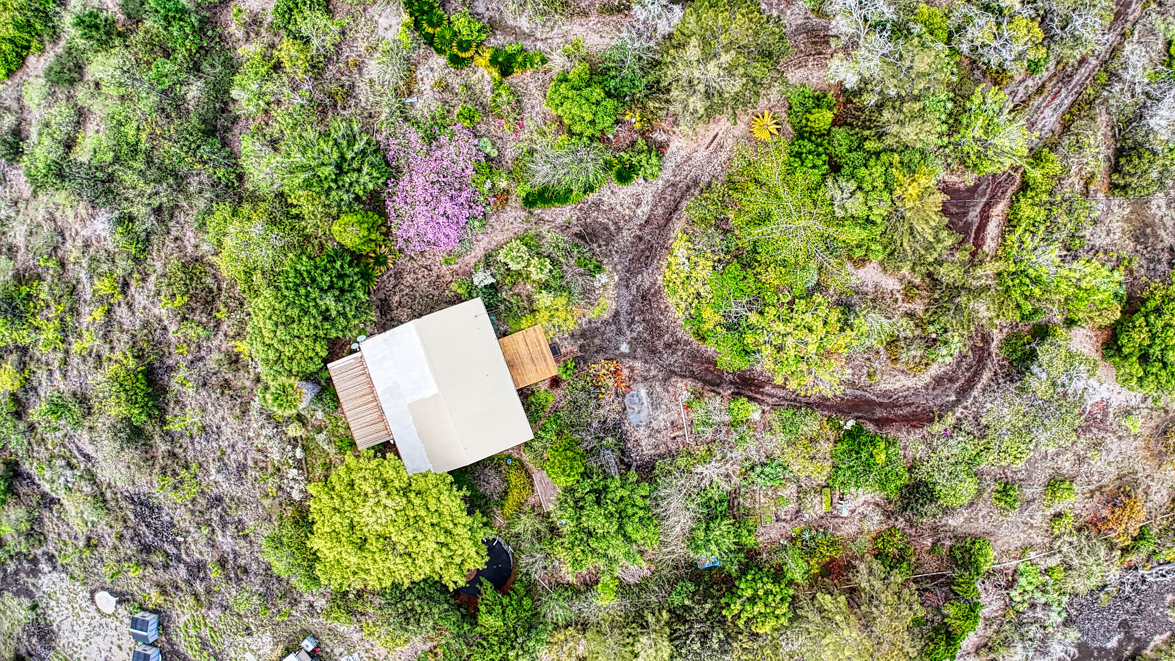 92-8233 Reef Parkway Ocean View, HI 96704 - Photo 3 of 30 an aerial view of a house with a yard and sitting area