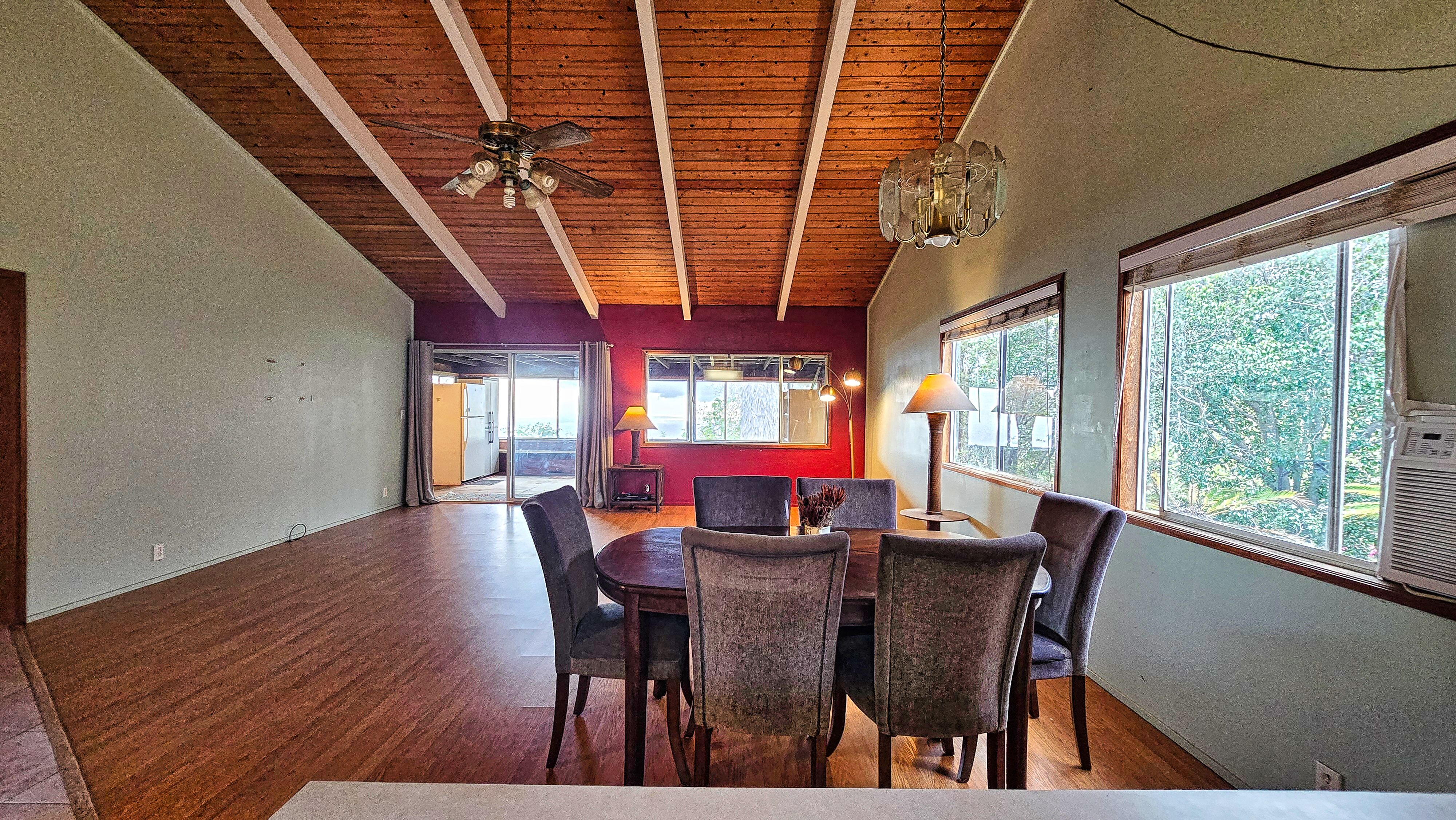 92-8233 Reef Parkway Ocean View, HI 96704 - Photo 8 of 30 a view of a dining room with furniture window and outside view
