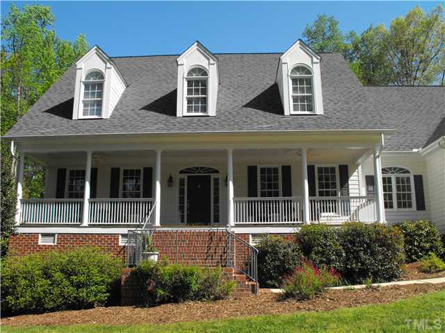 2124 Tibwin Drive Raleigh, NC 27606 - Photo 2 of 6 Truly a country front porch and welcoming entrance.