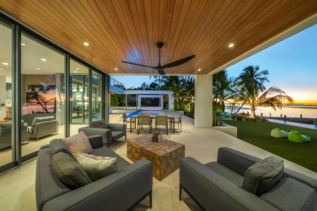 a bedroom with furniture and a book shelf