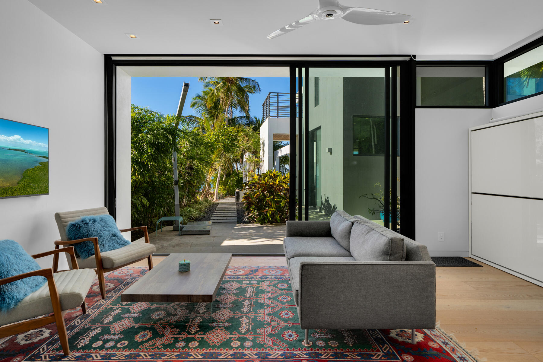 19 Avacado Street Islamorada, FL 33036 - Photo 60 of 104 a living room with furniture and a large window