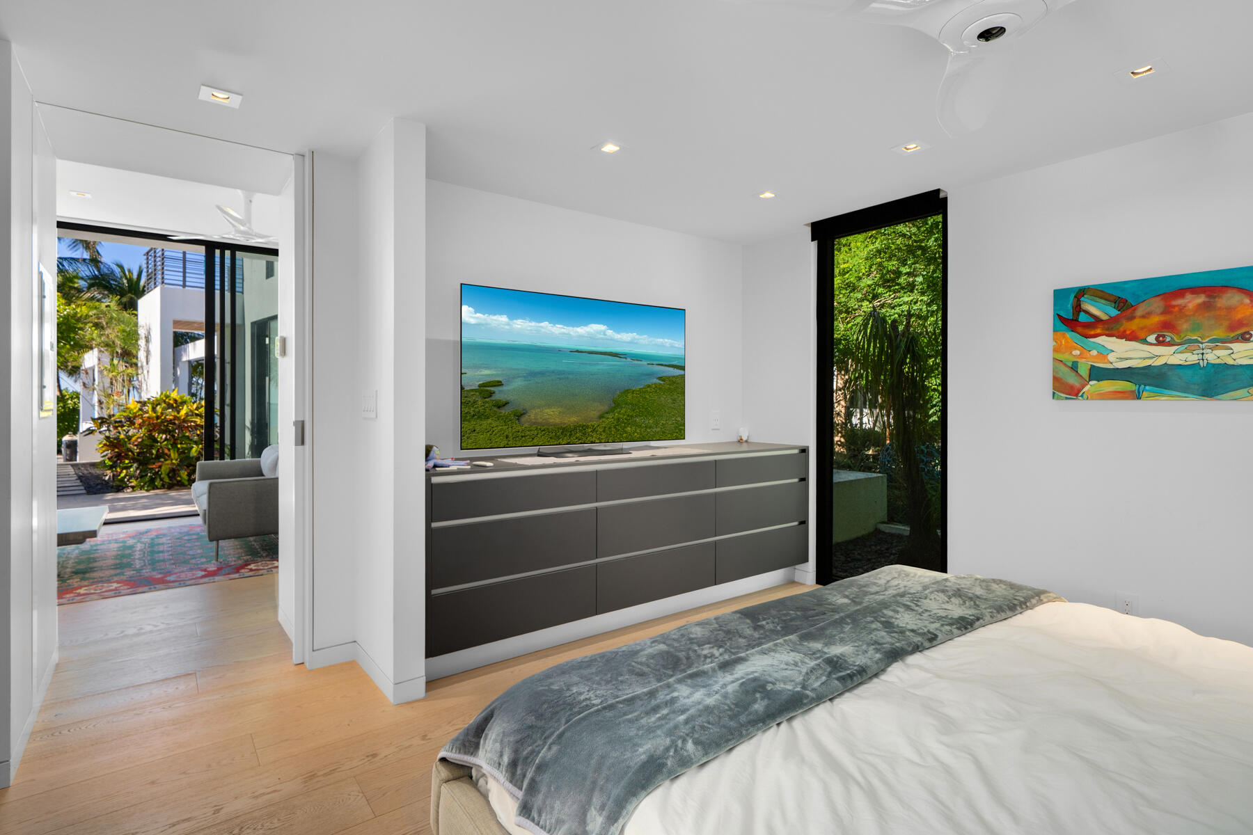 19 Avacado Street Islamorada, FL 33036 - Photo 64 of 104 a bedroom with a bed and a view of living room