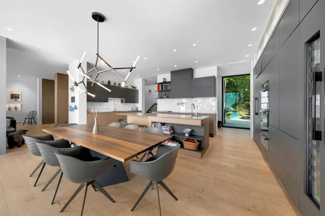 a view of swimming pool with palm trees