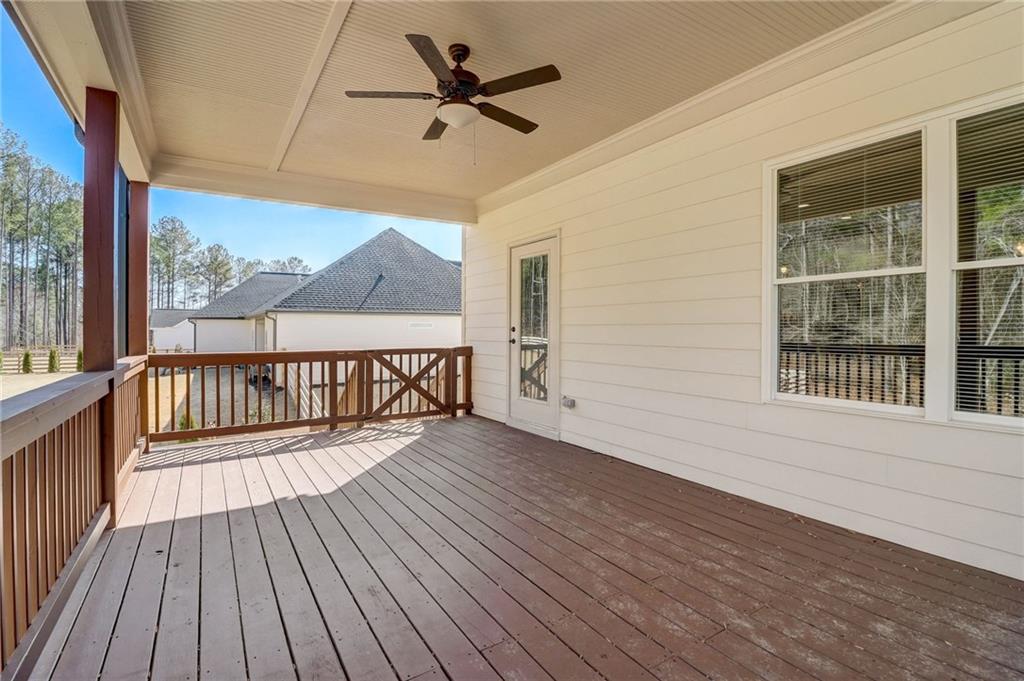 569 White Oak Way Monroe, GA 30655 - Photo 38 of 50 a view of a balcony with wooden floor
