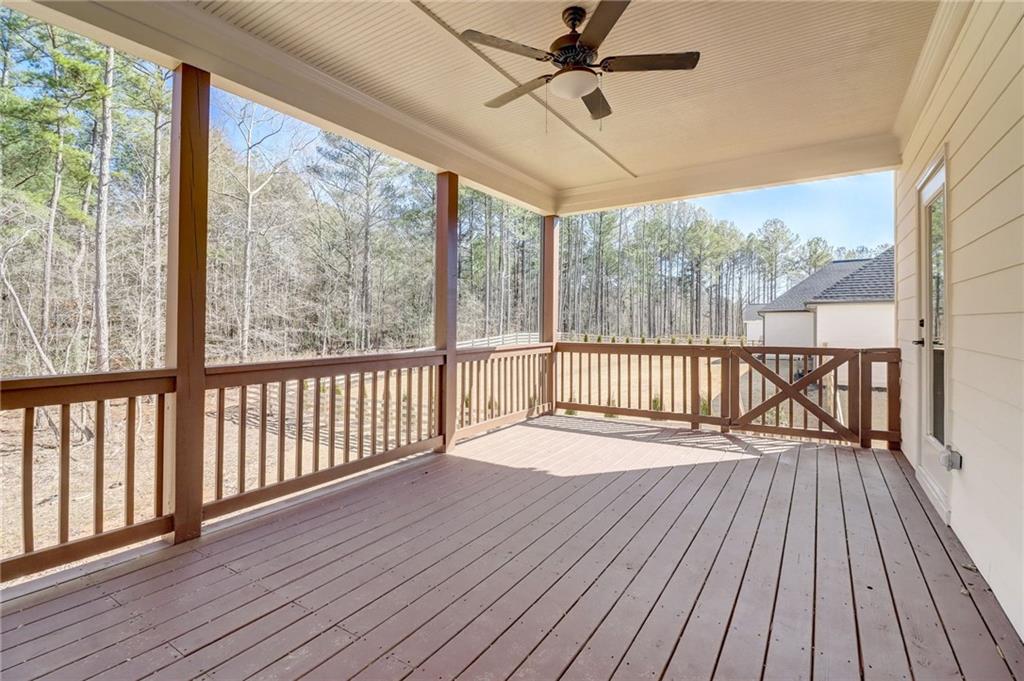 569 White Oak Way Monroe, GA 30655 - Photo 39 of 50 a view of a balcony with wooden floor