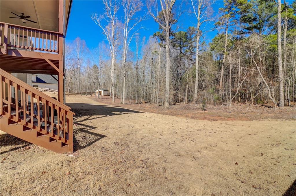 569 White Oak Way Monroe, GA 30655 - Photo 40 of 50 a view of street with wooden fence