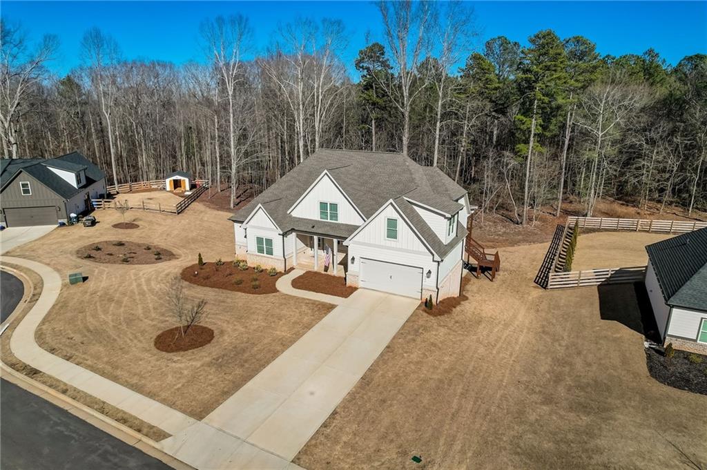 569 White Oak Way Monroe, GA 30655 - Photo 42 of 50 a view of a house with pool and chairs