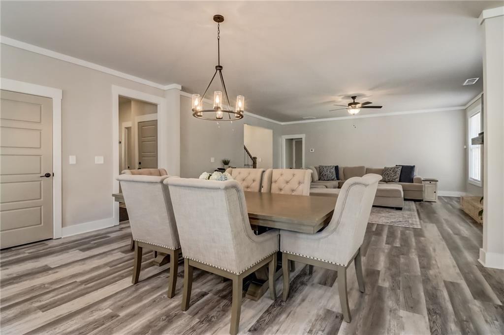 569 White Oak Way Monroe, GA 30655 - Photo 9 of 50 a view of a dining room with furniture