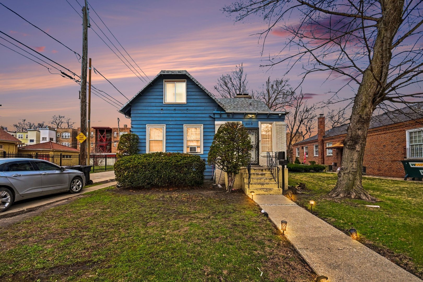 11110 South Union Avenue Chicago, IL 60628 - Photo 1 of 2 a view of a house with a patio