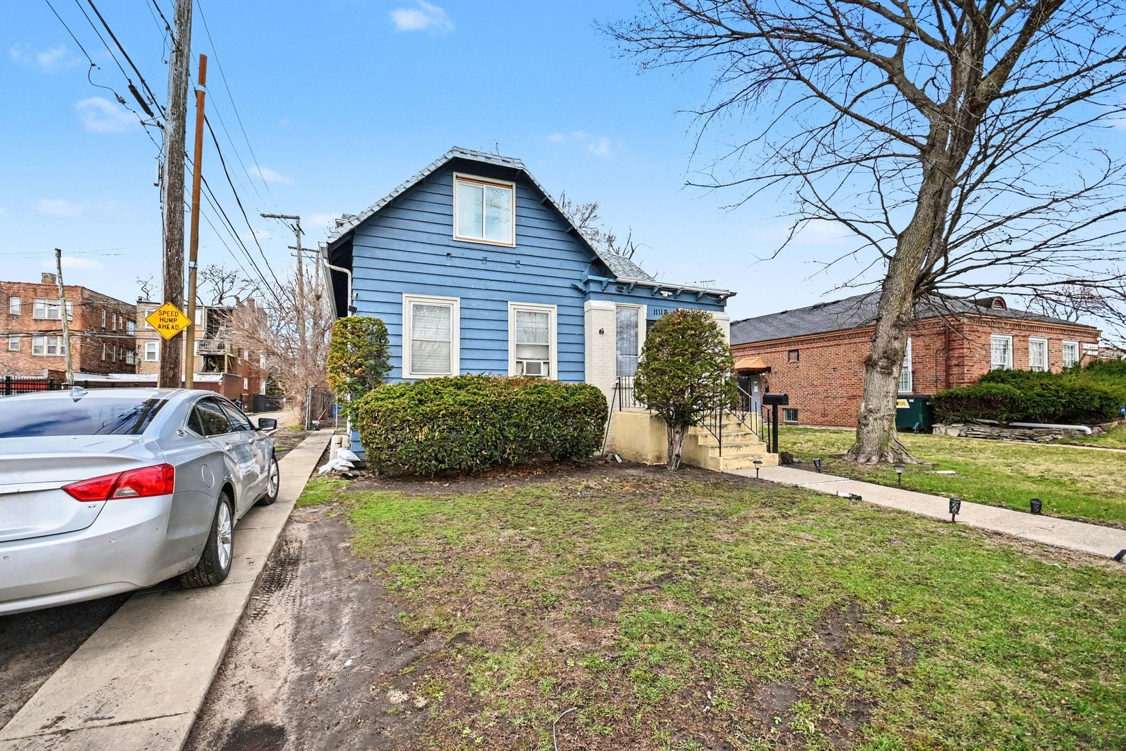 11110 South Union Avenue Chicago, IL 60628 - Photo 2 of 2 a view of a house with a back yard