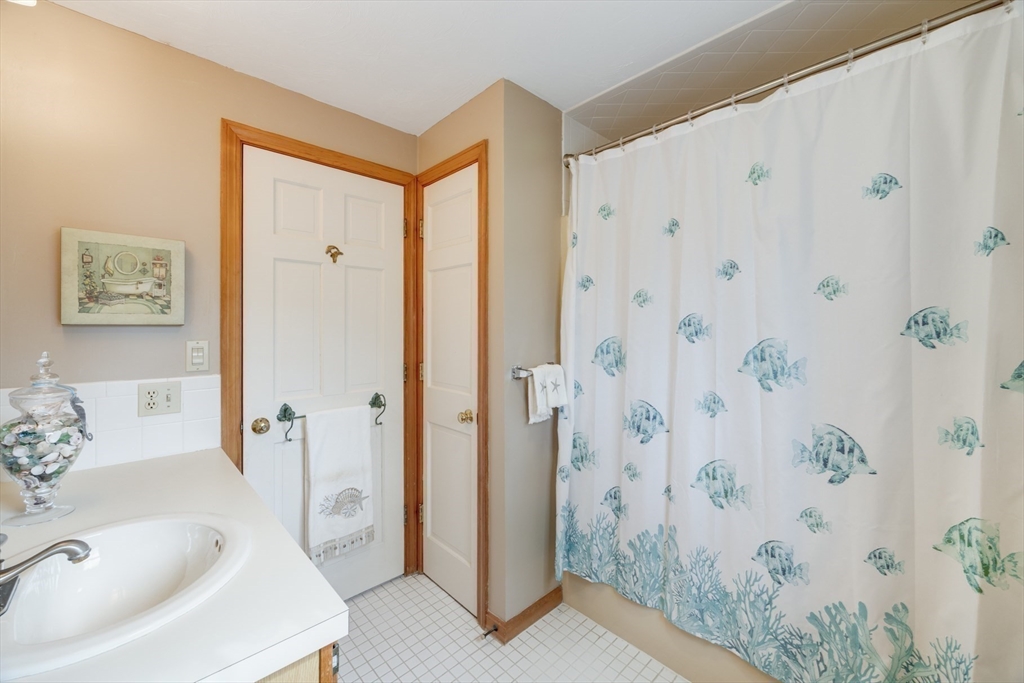 221 Camelback Road Barnstable, MA 02648 - Photo 17 of 31 a bathroom with a tub and shower