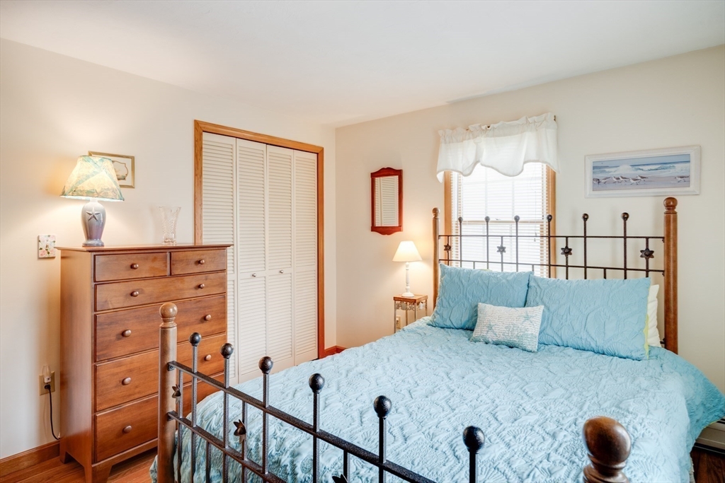 221 Camelback Road Barnstable, MA 02648 - Photo 21 of 31 a bedroom with furniture and wooden floor
