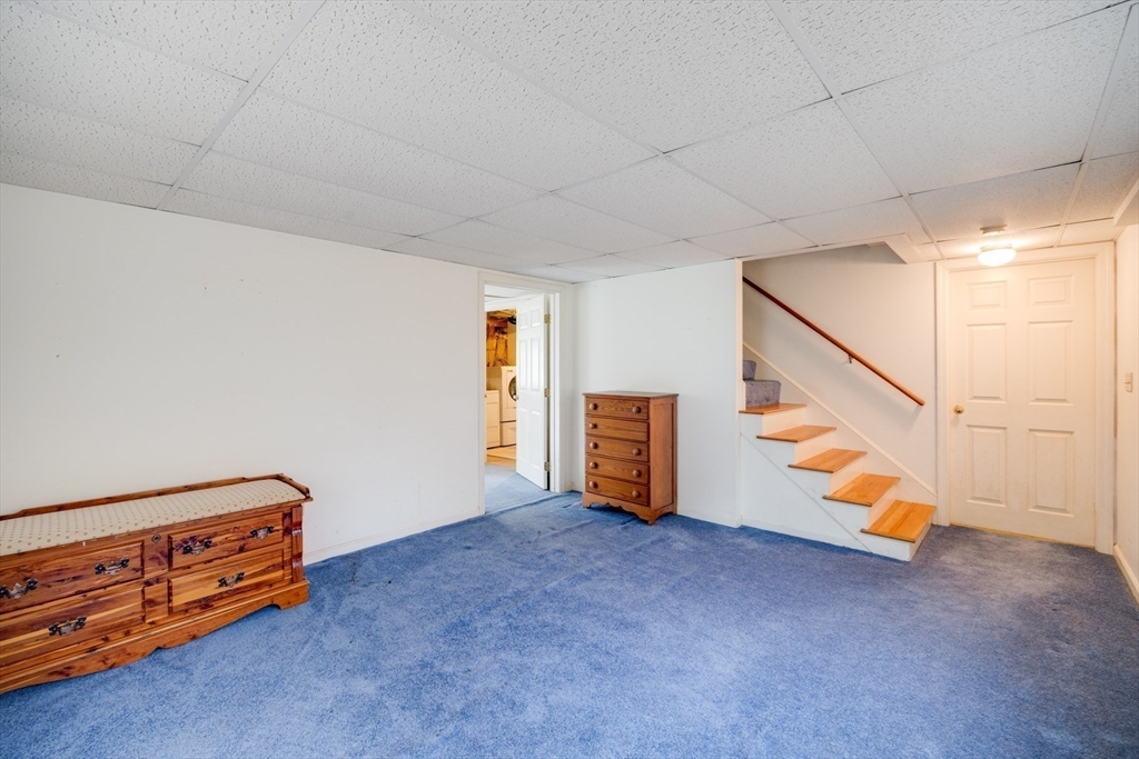 221 Camelback Road Barnstable, MA 02648 - Photo 25 of 31 a view of an empty room with stairs
