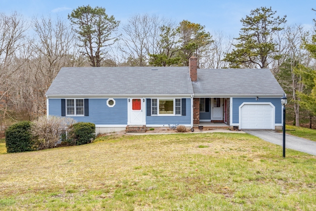 221 Camelback Road Barnstable, MA 02648 - Photo 31 of 31 a front view of a house with a garden