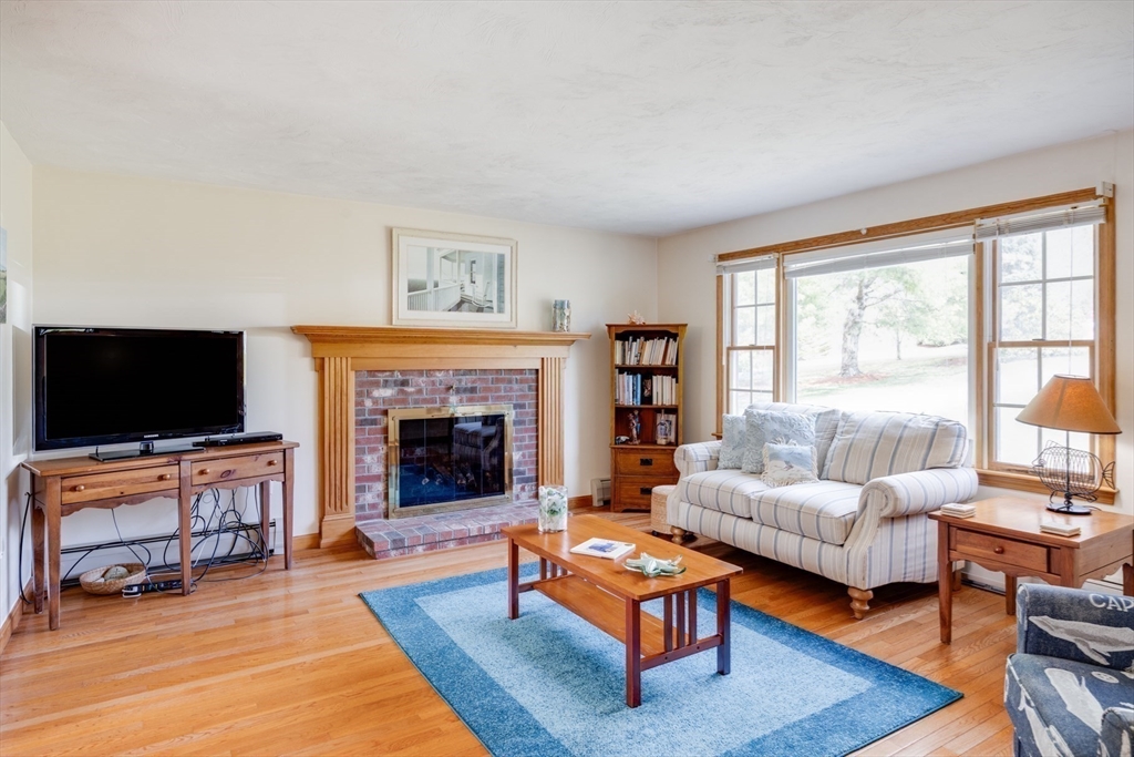 221 Camelback Road Barnstable, MA 02648 - Photo 6 of 31 a living room with furniture and a flat screen tv