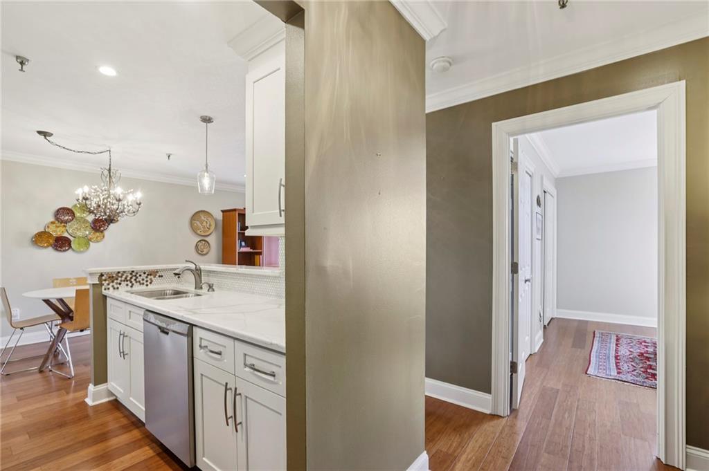 300 Johnson Ferry Road, Unit B804 Sandy Springs, GA 30328 - Photo 11 of 37 a kitchen with a sink and a refrigerator