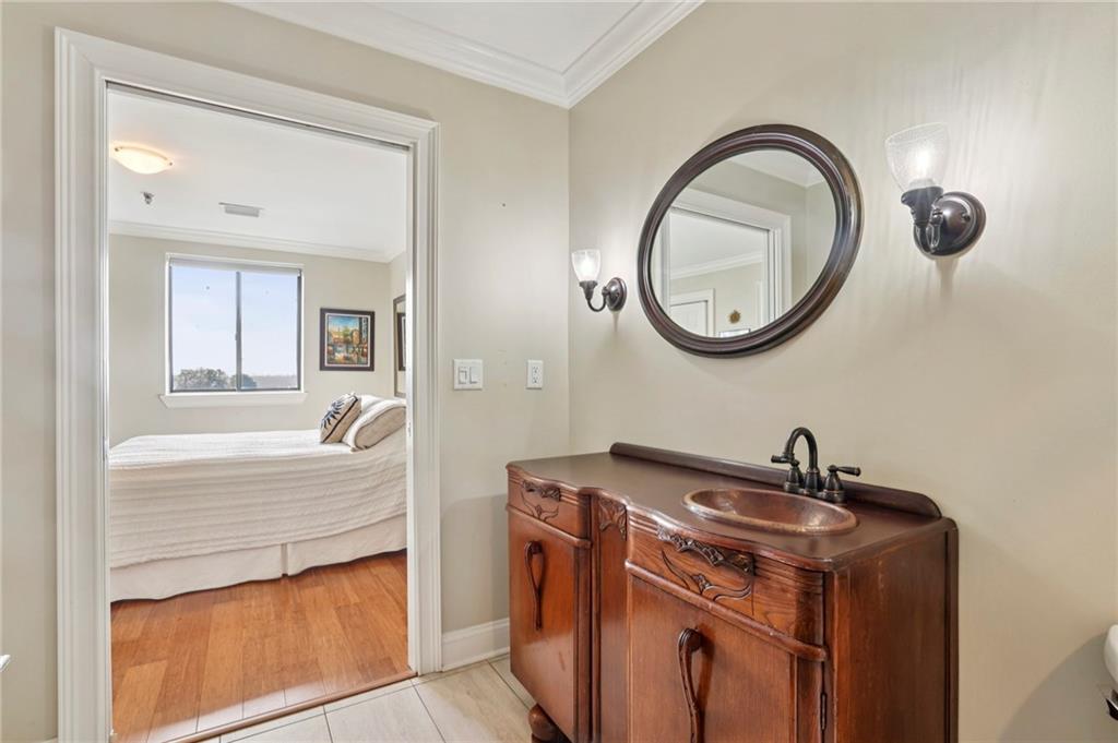 300 Johnson Ferry Road, Unit B804 Sandy Springs, GA 30328 - Photo 21 of 37 a bathroom with a sink and a mirror