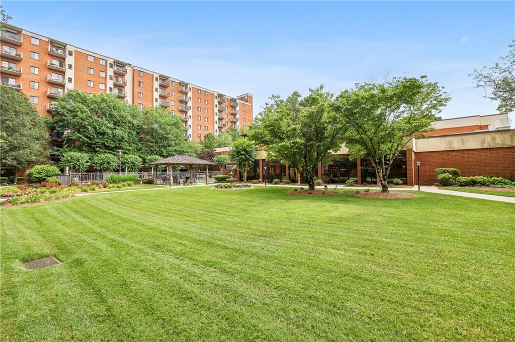 300 Johnson Ferry Road, Unit B804 Sandy Springs, GA 30328 - Photo 30 of 37 a view of building with outdoor space