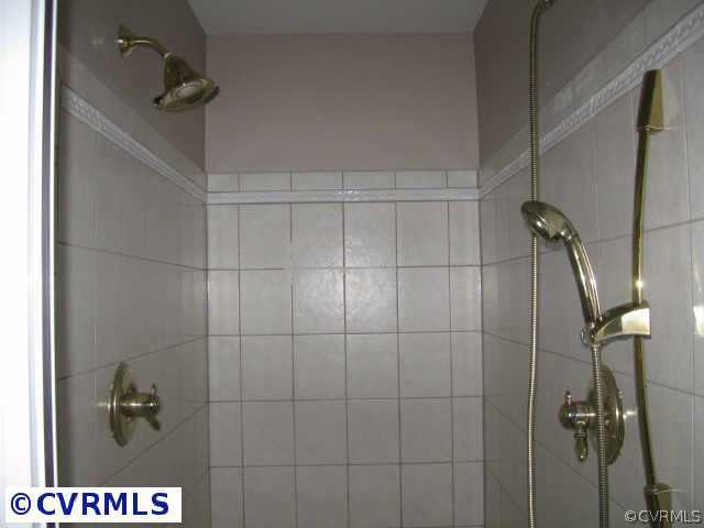 14319 River Road Chesterfield, VA 23838 - Photo 7 of 9 a bathroom with a shower