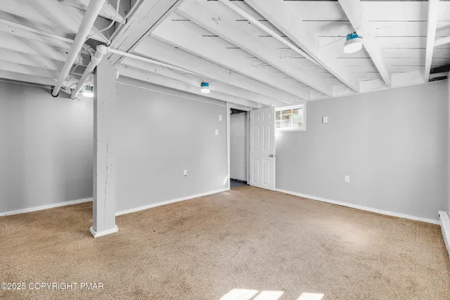 a view of backyard and car parked