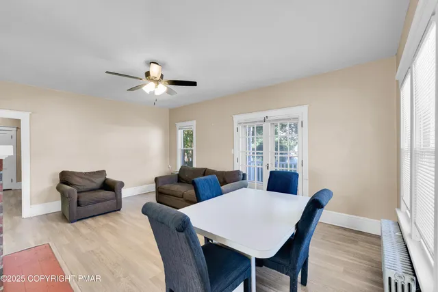 a view of a livingroom with furniture and window