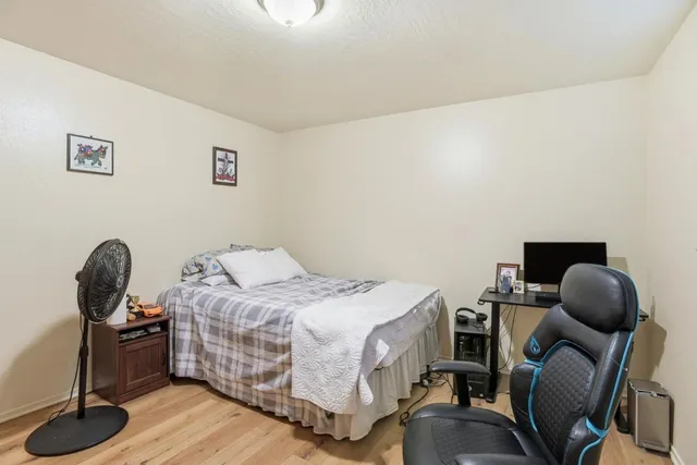 a view of a house with backyard porch and sitting area
