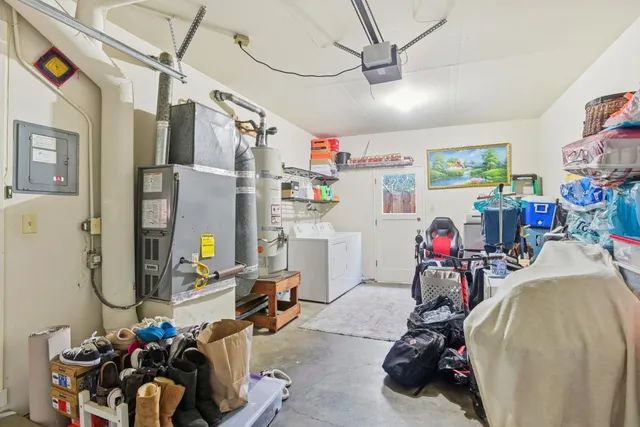 a view of a patio with table and chairs and potted plants