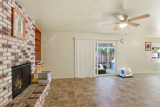 a kitchen with stainless steel appliances a stove a refrigerator and cabinets