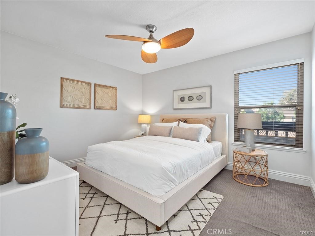 61 Orange Blossom Irvine, CA 92618 - Photo 13 of 40 a bedroom with bed and window