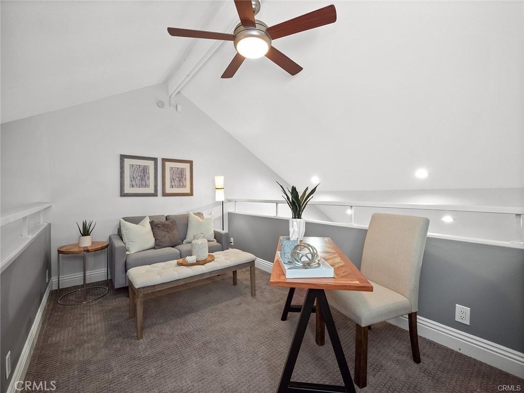 61 Orange Blossom Irvine, CA 92618 - Photo 20 of 40 a living room with furniture and a potted plant