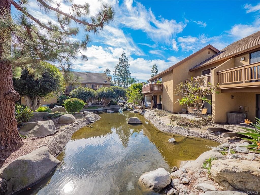 61 Orange Blossom Irvine, CA 92618 - Photo 26 of 40 a view of swimming pool with outdoor seating and a patio