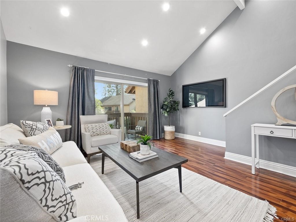 61 Orange Blossom Irvine, CA 92618 - Photo 3 of 40 a living room with furniture and a window