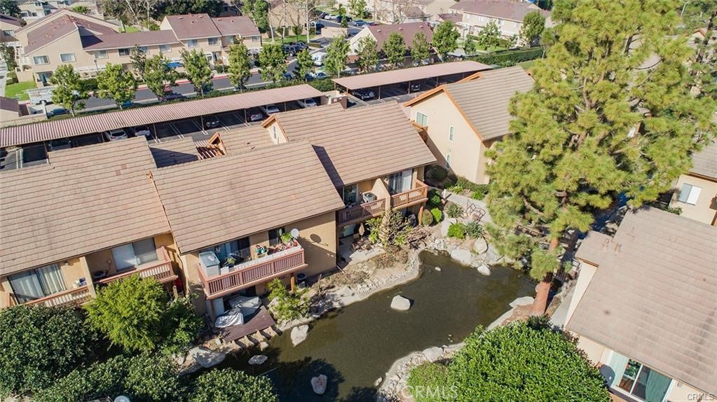 61 Orange Blossom Irvine, CA 92618 - Photo 32 of 40 an aerial view of a house with yard