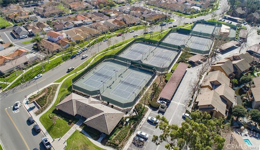 61 Orange Blossom Irvine, CA 92618 - Photo 35 of 40 an aerial view of a house with a garden