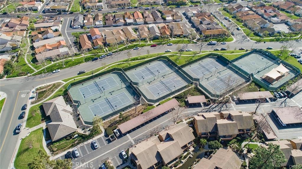 61 Orange Blossom Irvine, CA 92618 - Photo 36 of 40 an aerial view of a house with a swimming pool