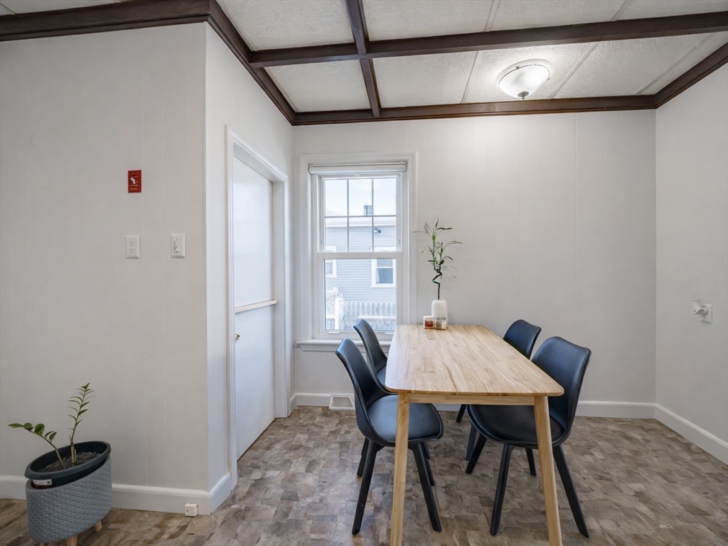 10 Guild Road Saugus, MA 01906 - Photo 14 of 32 a view of a dining room with furniture and window