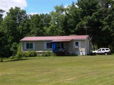 2266 County Highway Oneonta, NY 13820 - Photo 1 of 1 covered porch looks out towards creek. 3 bedroom 2 bath doublewide on full foundation. Large family room addition on other side of home.