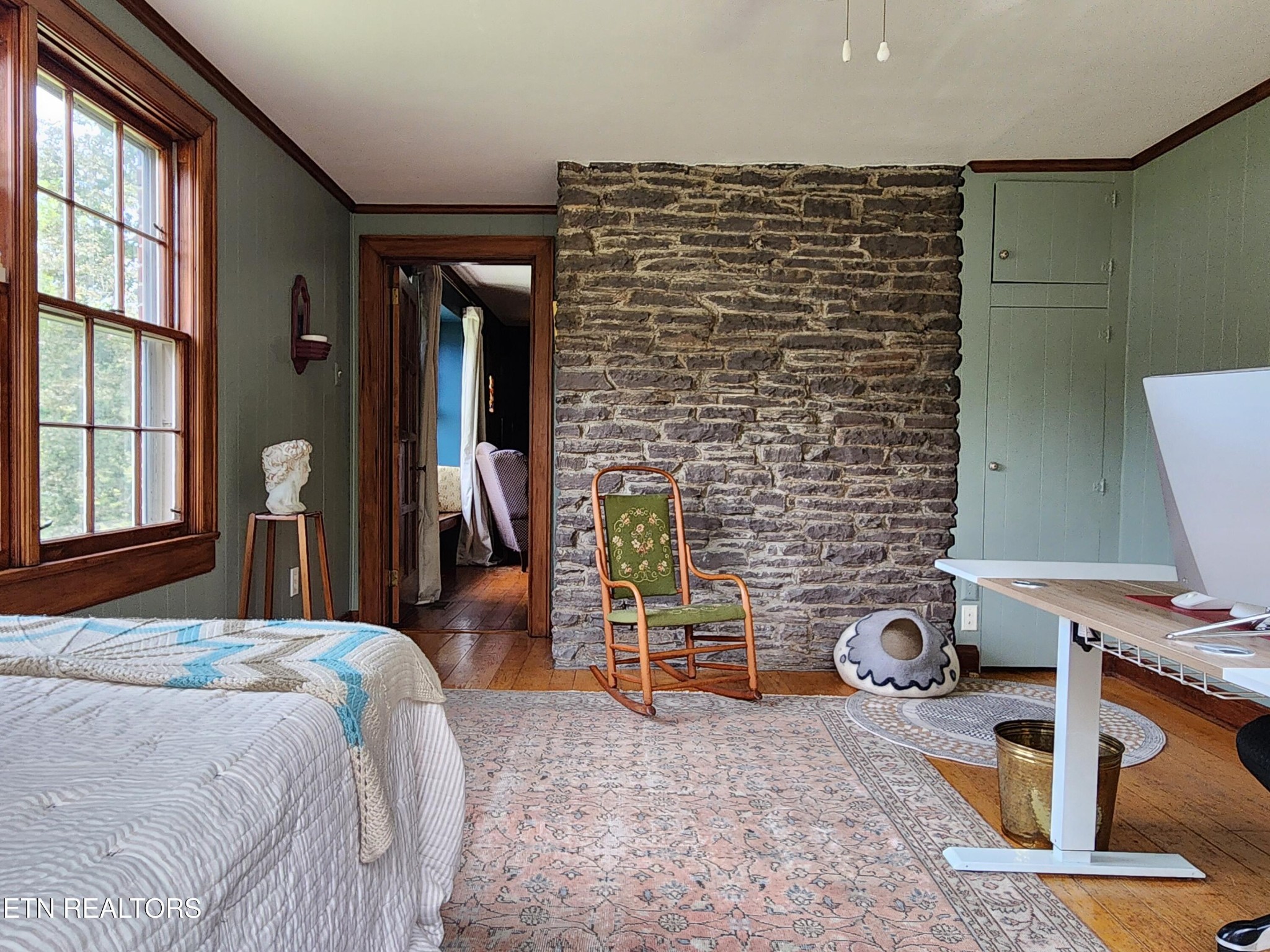 200 East Red Bud Road Knoxville, TN 37920 - Photo 19 of 60 a bed room with a bed and a chair