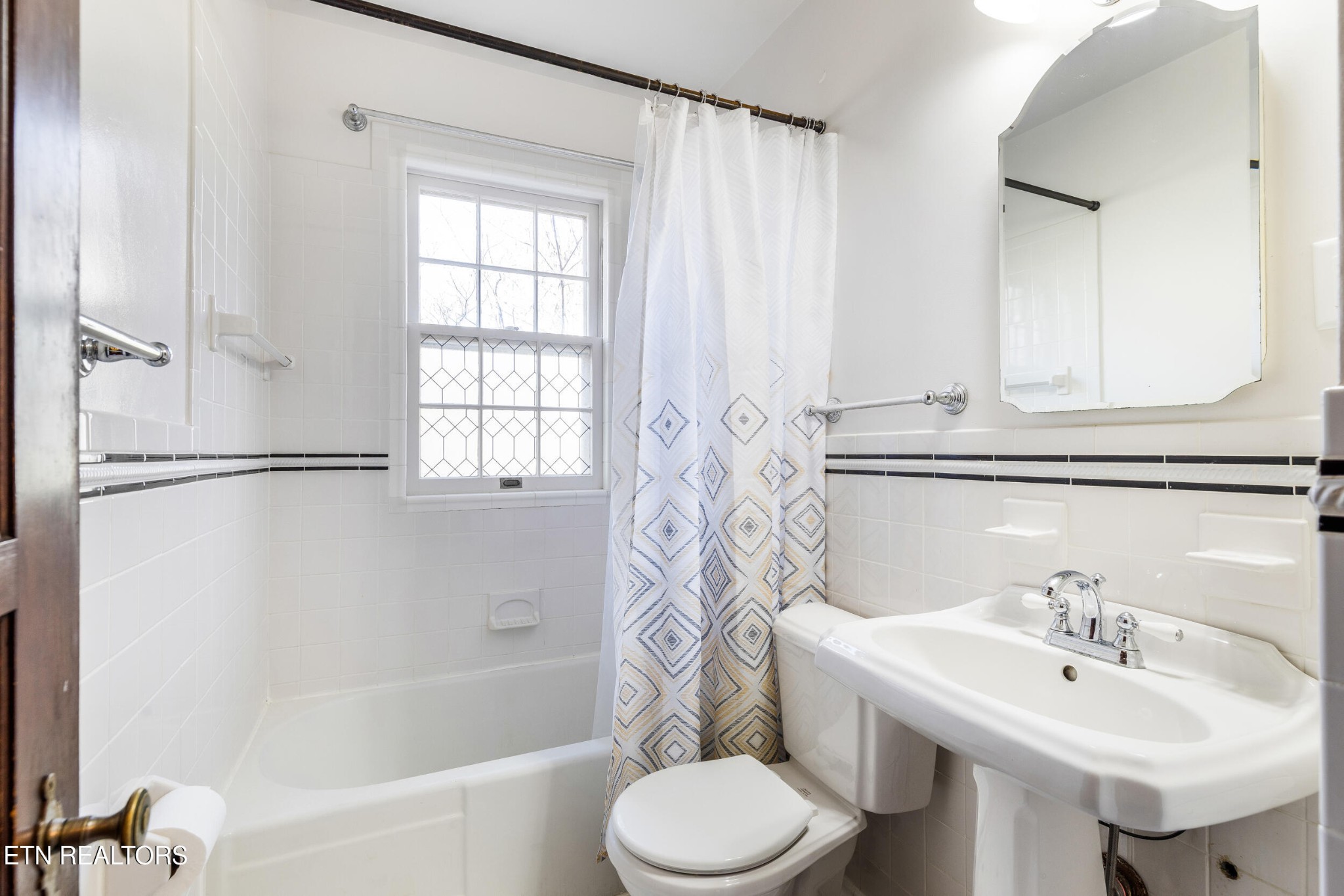 200 East Red Bud Road Knoxville, TN 37920 - Photo 24 of 60 a bathroom with a sink toilet and shower