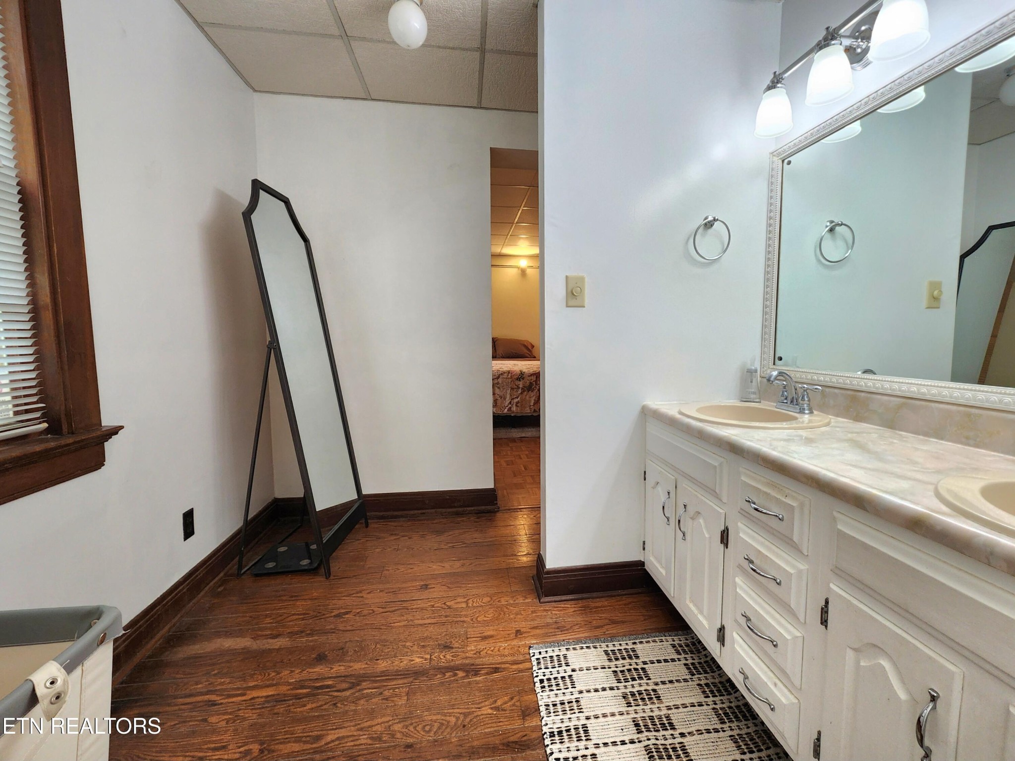 200 East Red Bud Road Knoxville, TN 37920 - Photo 26 of 60 a bathroom with a double vanity sink and a mirror
