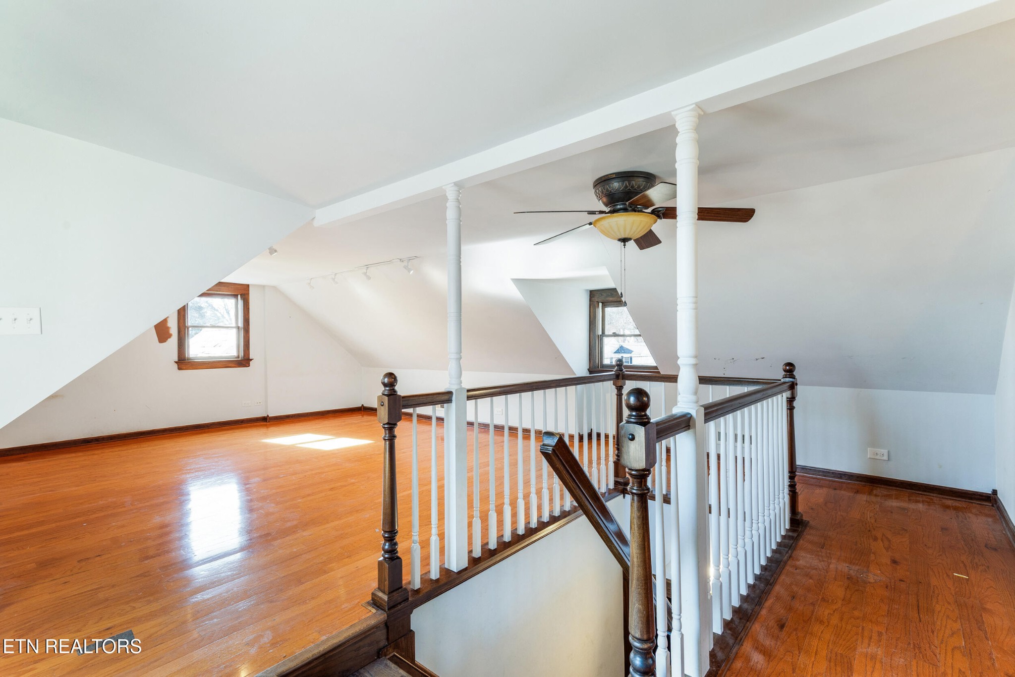 200 East Red Bud Road Knoxville, TN 37920 - Photo 31 of 60 a view of a hallway with wooden floor and stairs