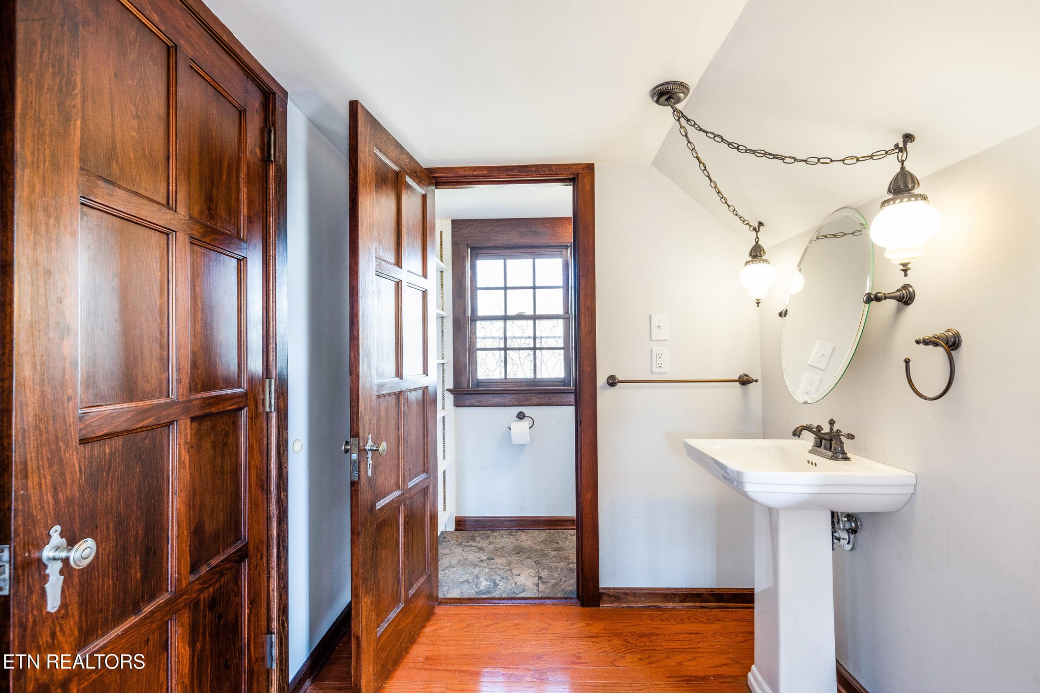 200 East Red Bud Road Knoxville, TN 37920 - Photo 32 of 60 a bathroom with a sink and mirror