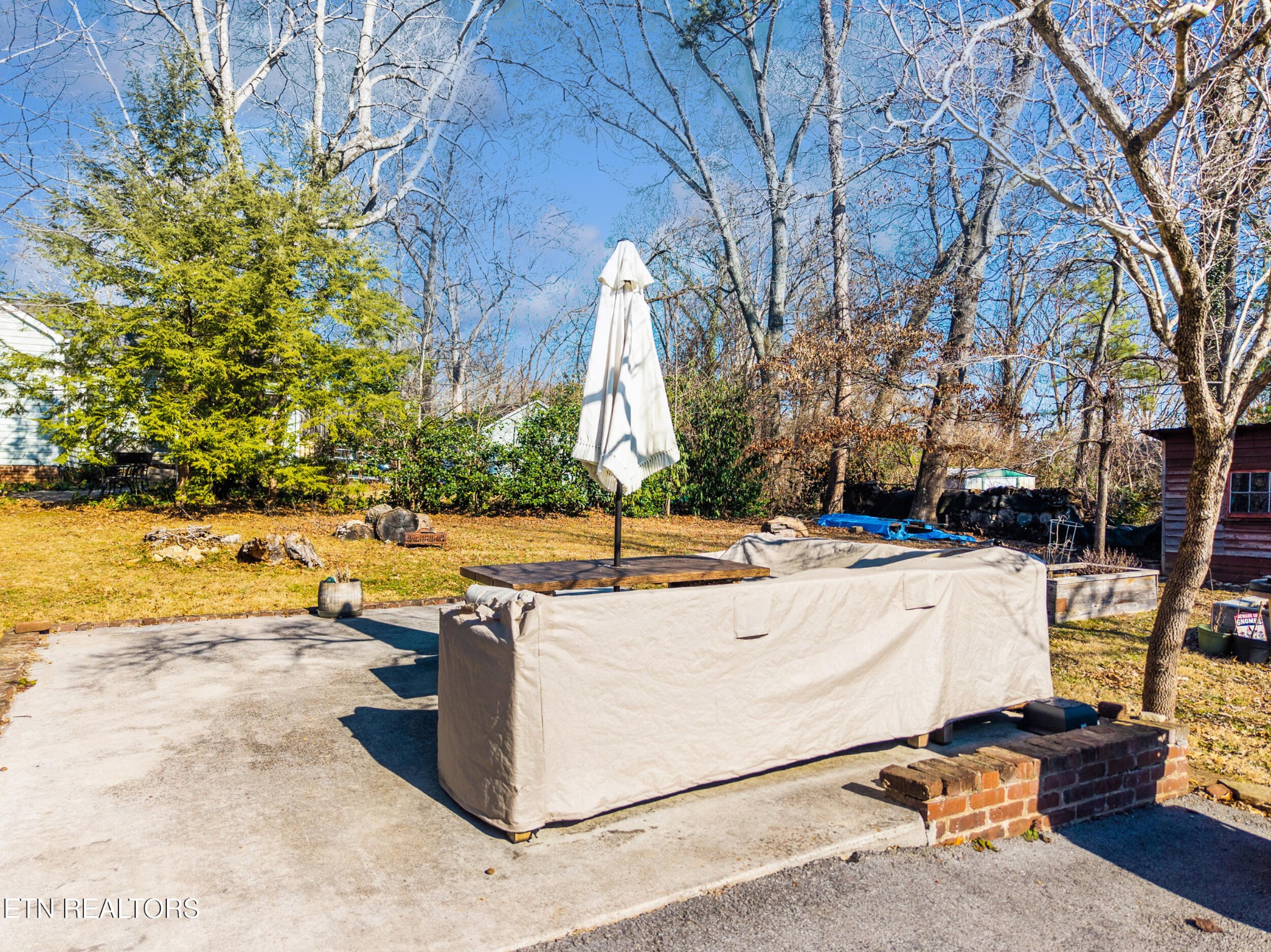 200 East Red Bud Road Knoxville, TN 37920 - Photo 40 of 60 a view of yard with swimming pool and sitting area