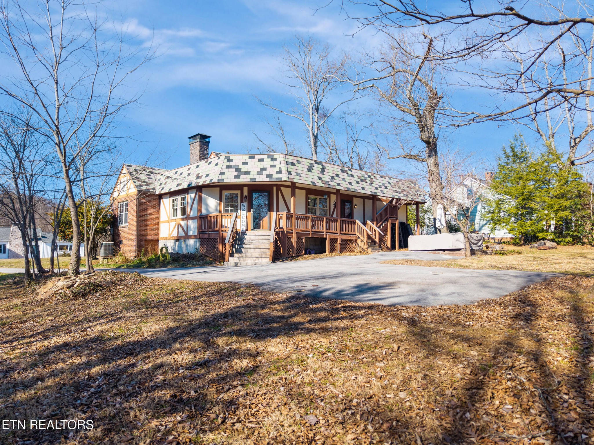 200 East Red Bud Road Knoxville, TN 37920 - Photo 43 of 60 a front view of a house with a yard