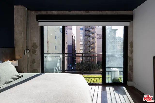 a view of balcony with wooden floor and stairs