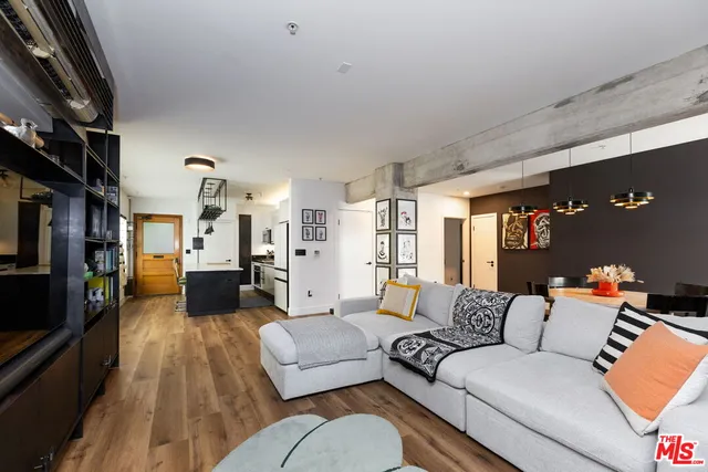 a view of a dining room with furniture and window