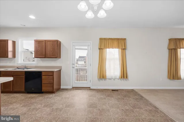 a view of livingroom with washer and dryer